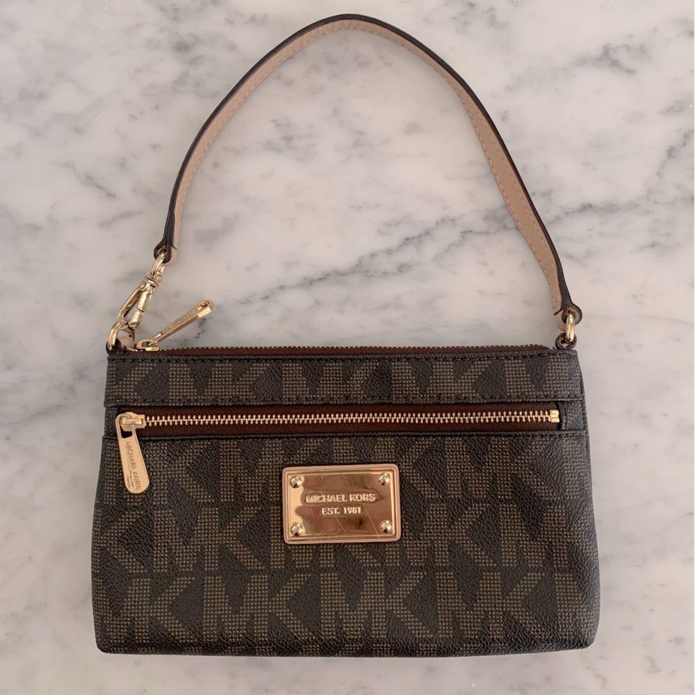 Michael Kors mini bag turns into wristlet with gold details